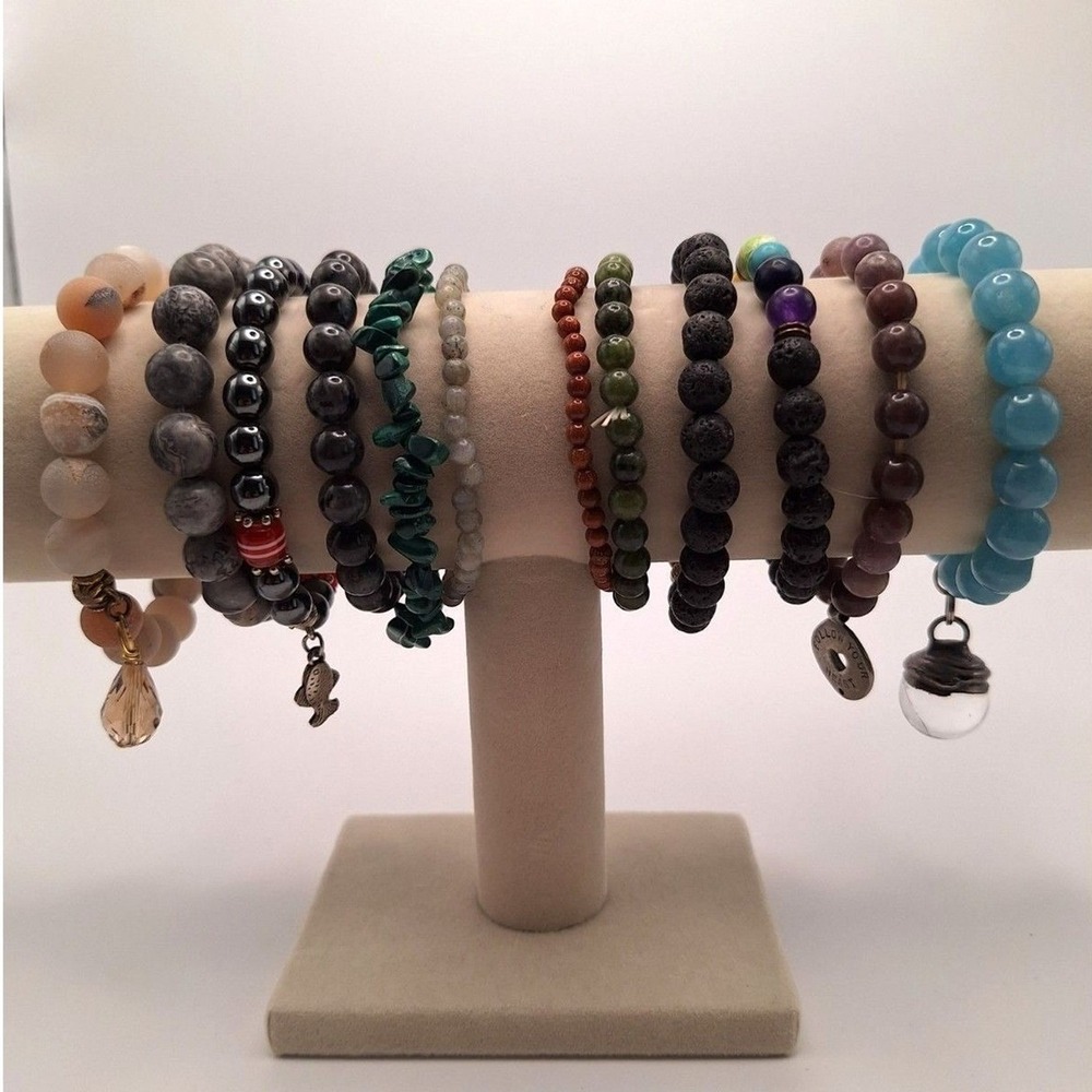 Beaded bracelets stretch set of 12 some with charms about 7.25 inches